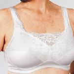 Style: 765
Romantic camisole bra, all over sheer scalloped Stretch lace insert to create a “U” neckline. Can be worn alone under a jacket or low neckline blouse.
Straps have reinforced scalloped lace. Sizes: 34-44A,B,C,D,E  Colors: Beige, White, Black
