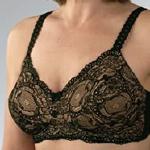 Style: 779, 
Sensual, romantic underwire bra. All over scalloped lace, color on color effect for cups and front gosset.  Pockets - specially designed cotton/spandex to accommodate prostheses.  Straps - embroidered, lined, adjustable back Sizes: 34-42B,C,D  Colors: Beige on Beige, Black over Beige, White over Beige, Burgundy over Beige
